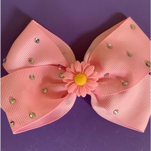 Bedazzled light pink flower clip bow